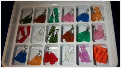 Bottom tray of dispense tips